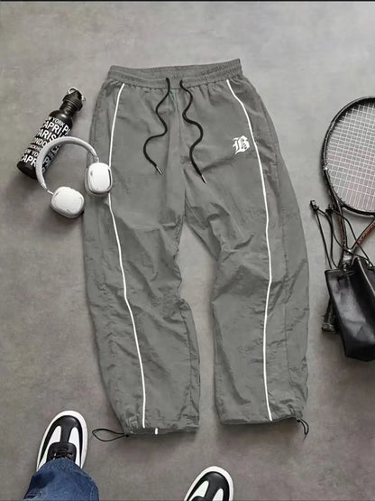 Men's Lightweight Casual Sporty Long Pants with Elastic Cuffs and Fashionable Print, Ideal for Everyday Wear