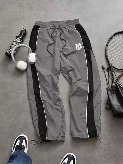 Men's Lightweight Casual Sporty Long Pants with Elastic Cuffs and Fashionable Print, Ideal for Everyday Wear
