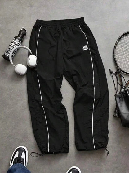 Men's Lightweight Casual Sporty Long Pants with Elastic Cuffs and Fashionable Print, Ideal for Everyday Wear