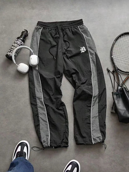 Men's Lightweight Casual Sporty Long Pants with Elastic Cuffs and Fashionable Print, Ideal for Everyday Wear